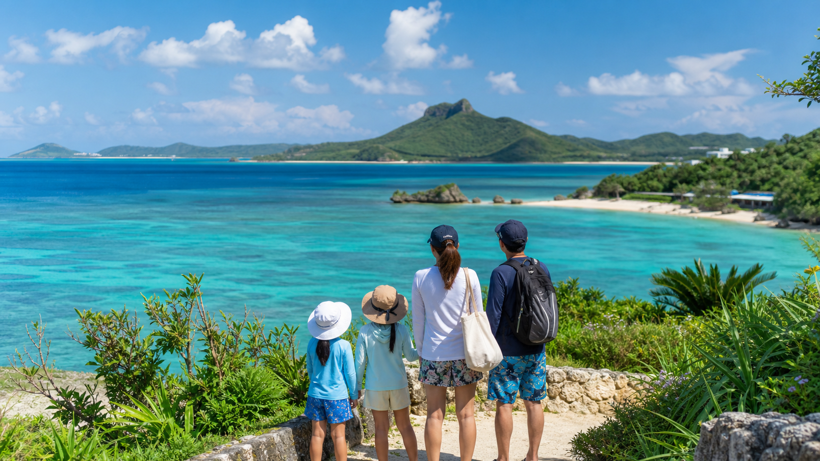 沖縄の海を眺めながら旅行の一日を楽しむ家族の様子